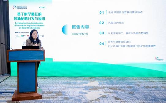 A person standing at a podium<i></i><i></i>
<i></i><i></i>
AI-generated co<i></i>ntent may be incorrect.